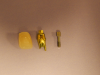 Fig 9. A gold screw, the abutment, and the crown itself.
