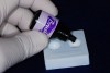 Figure 7  Brush & Bond liquid was dispensed into a dappen dish.